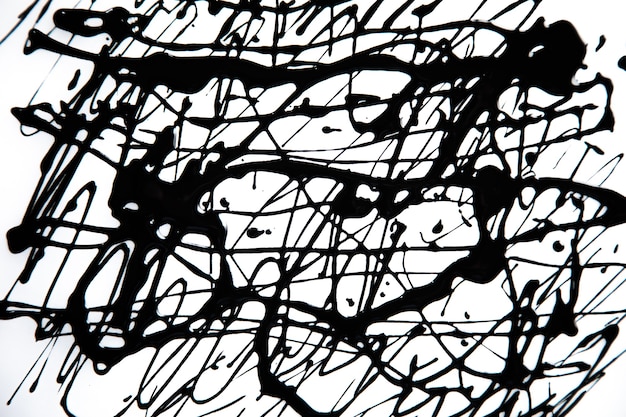 Photo black abstract paint on the white