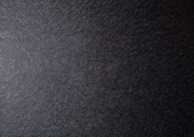 Black abstract rough scratch background with copy space for design