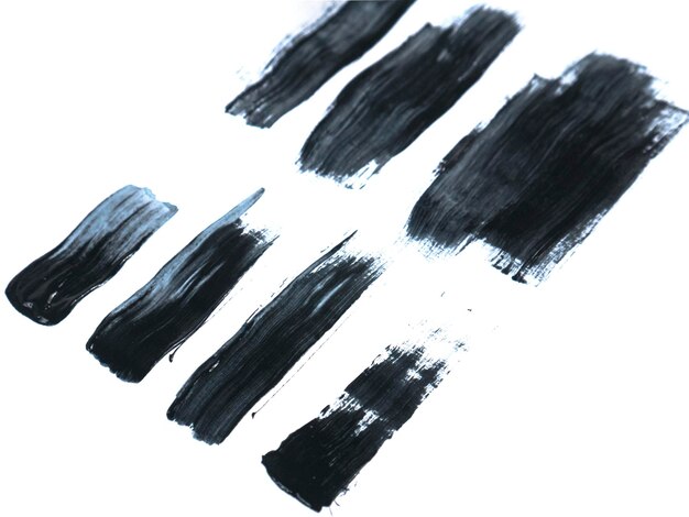 black acrylic paint stroke isolated on white background abstract art concept