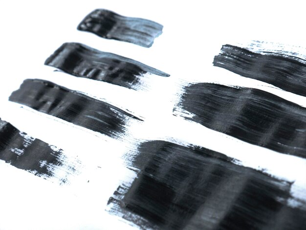 black acrylic paint stroke isolated on white background abstract art concept