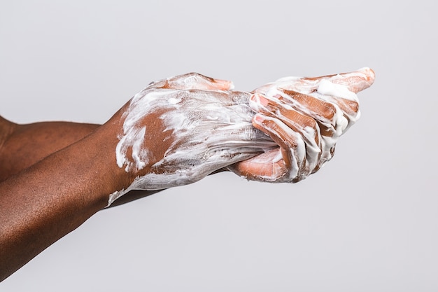 Black african american man washing hands  