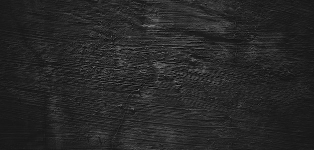 Black background of natural paintbrush stroke textured cement or stone oldHorror Cement Texture Grunge scary background Wall Concrete Old black