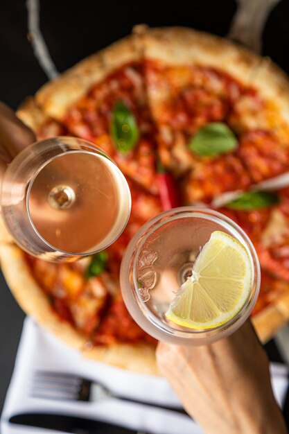 Black background and pizza tasty pepperoni pizza and cooking\
tasty traditional italian pizza