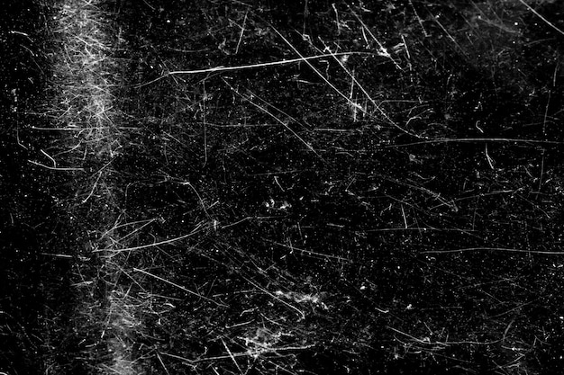 on a black background white spots with scratches. grunge design