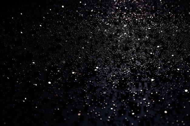 Black background with bokeh and water droplets abstract background