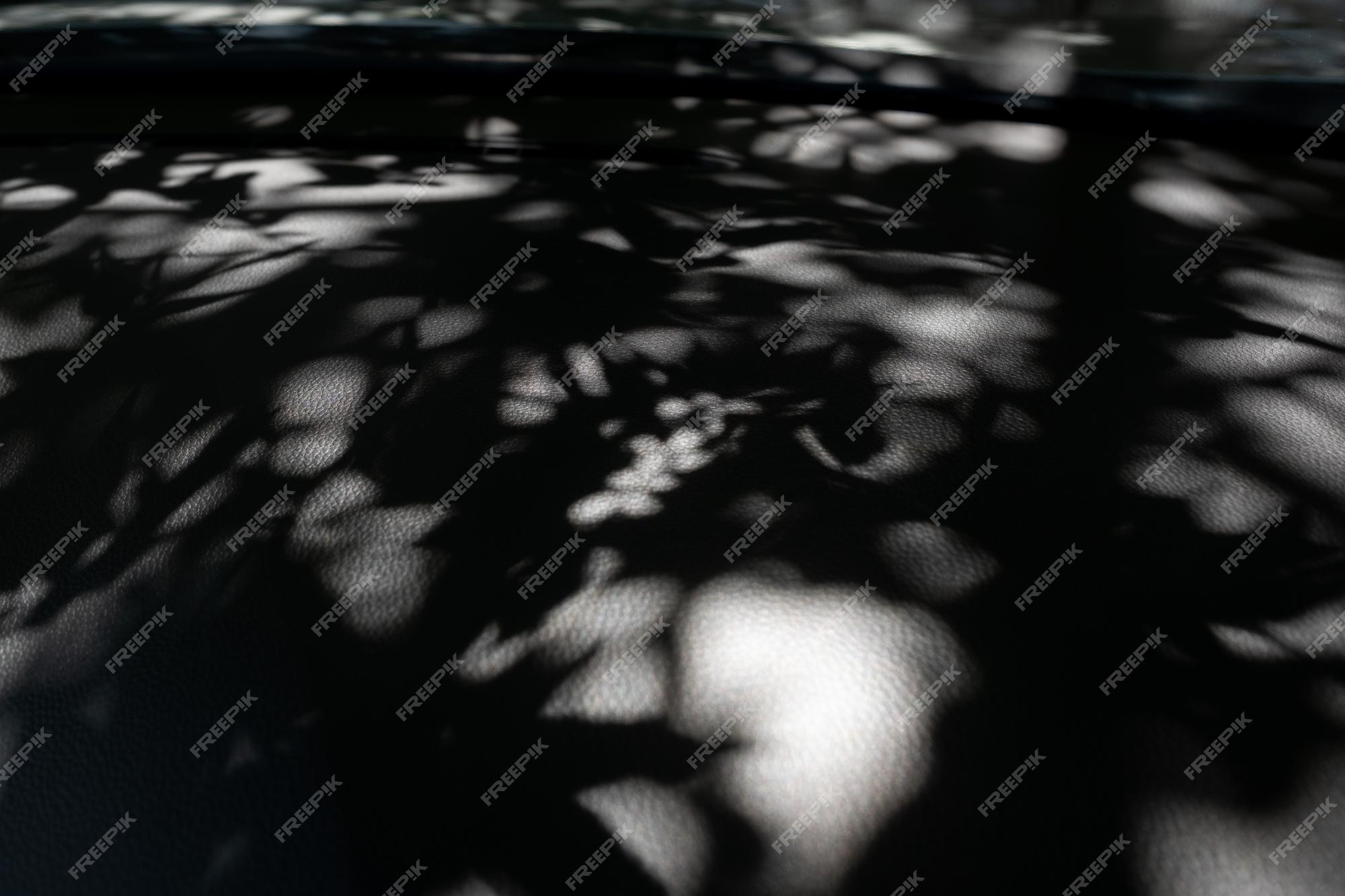 Premium Photo | Black background with shadow wallpaper