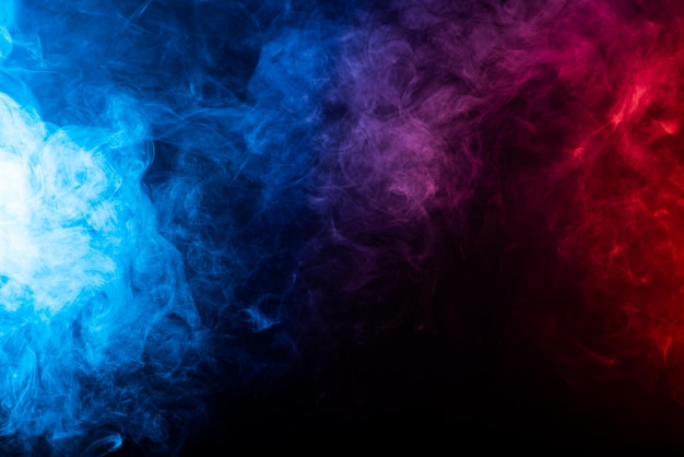 Black background with smoke colours Cloud of smoke with different colours