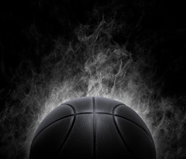 Black basketball with on the smoke background