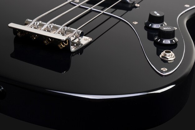 Black bass guitar closeup