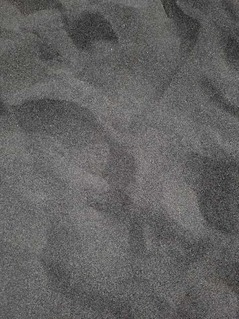 Photo black beach sand texture