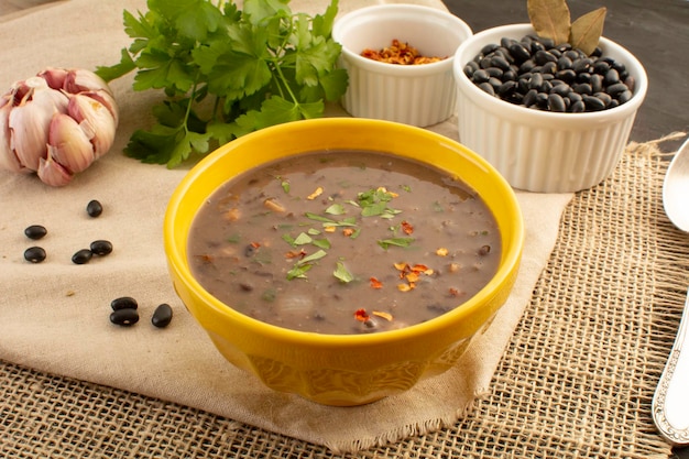 Black bean soup a hot chili with meat winter Mexican food