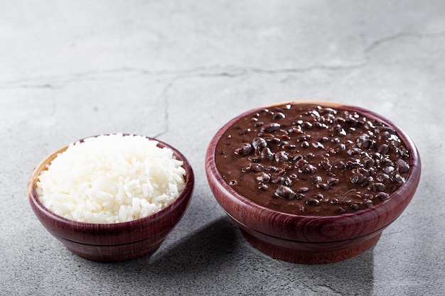 Black beans and rice in wooden bowl