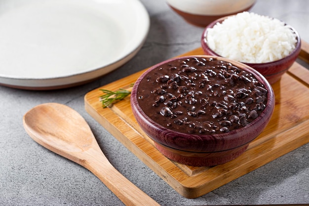 Black beans and rice in wooden bowl