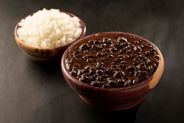 Black beans and rice in wooden bowl