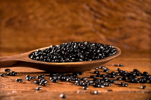 black beans on wooden table