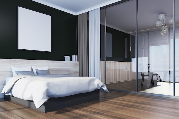 Черный угол спальни с деревянным полом и главной кроватью с квадратным плакатом над ней.
