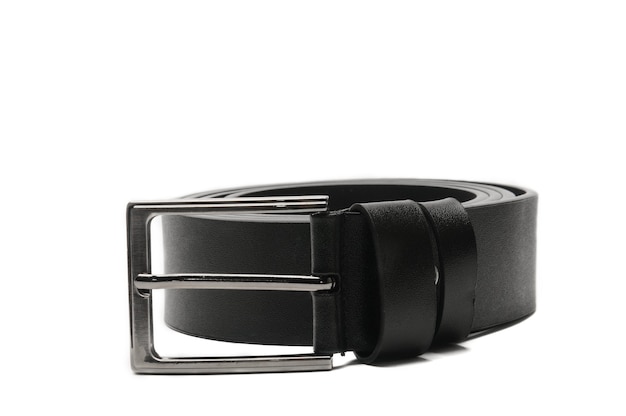 Black belt with a metal fastener on an isolated white