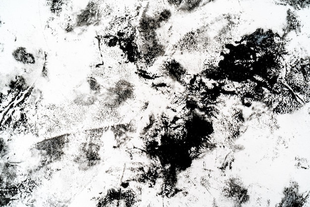 Black blots and spots on a white background