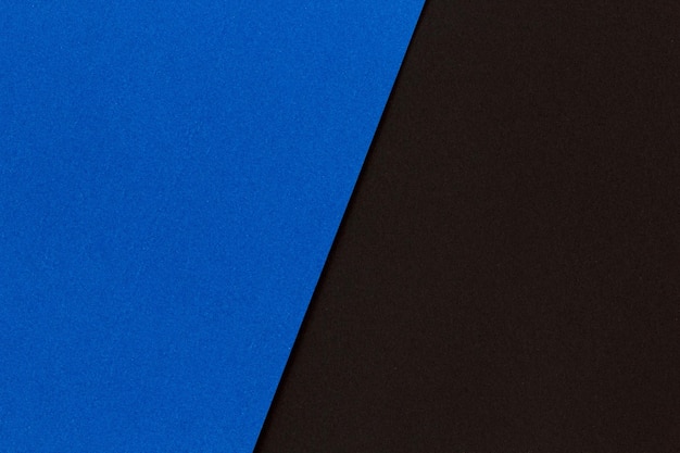 Black and blue color paper flat lay background