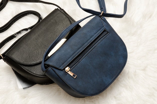 Black and blue handbags. 