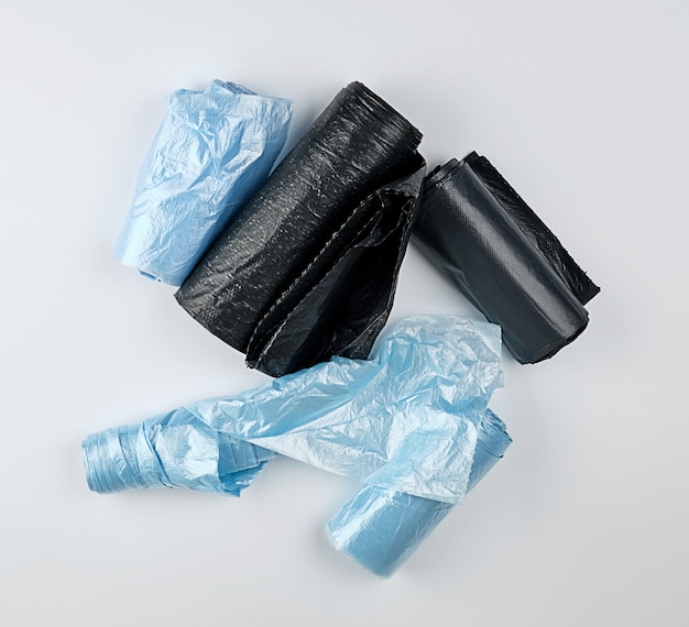 Black and blue plastic bags for trash can