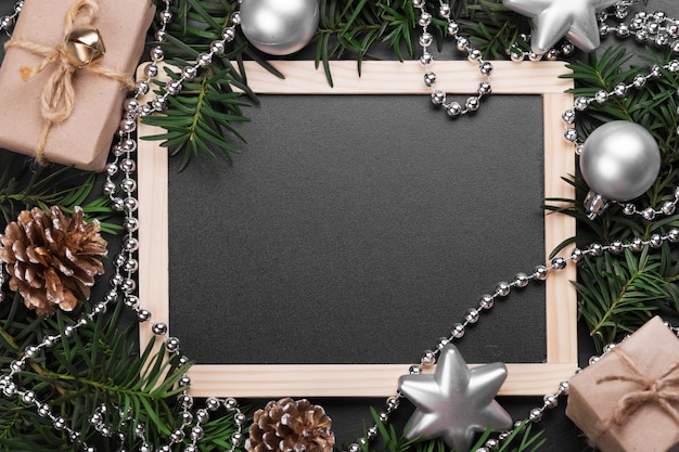 Black board with Christmas handmade presents Happy New Year Space for text