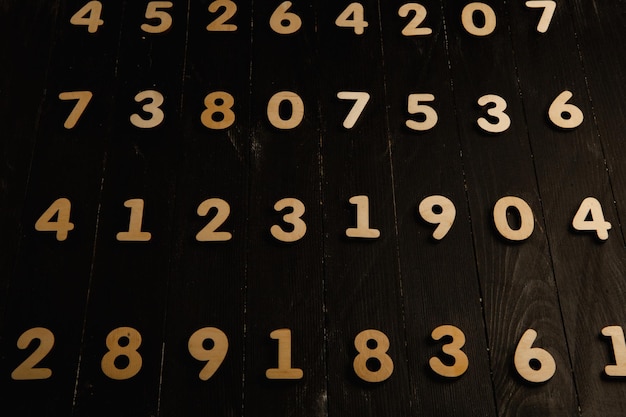 A black board with numbers that say the number 9 and 9.