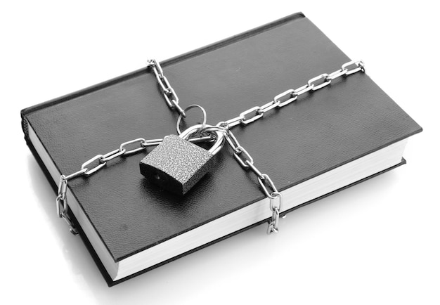 Black book with chain isolated on white