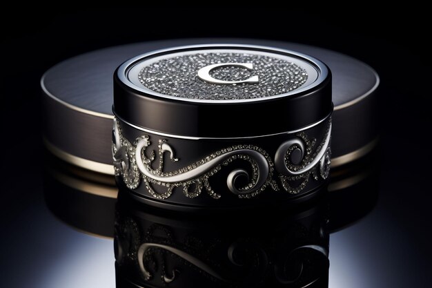 a black box with a silver glitter and a black lid