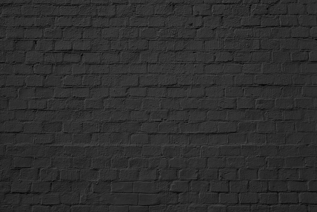 Photo black brick building wall. interior of a modern loft. background for design