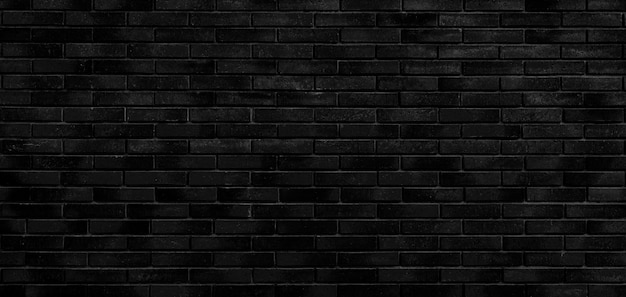 Black brick wall. Loft interior design. Black paint of the facade.