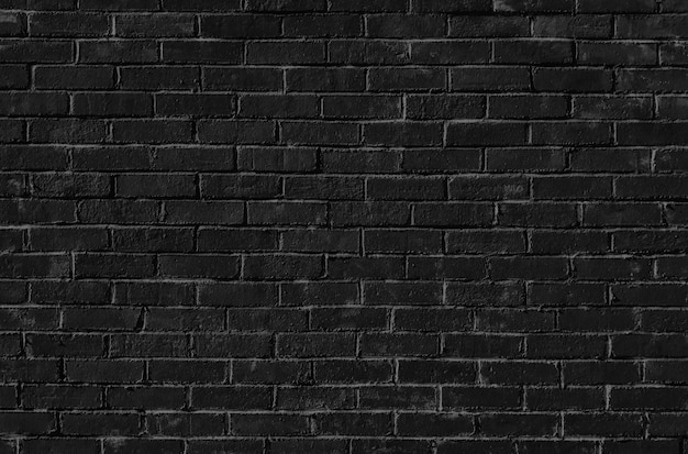 Photo black brick wall texture black and white brick wall closeup