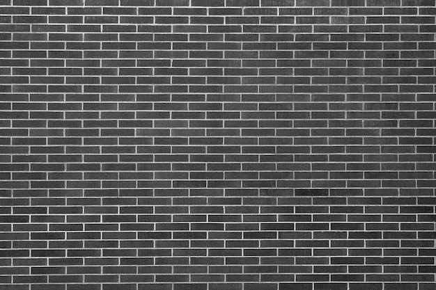 Black brick wall with a white background