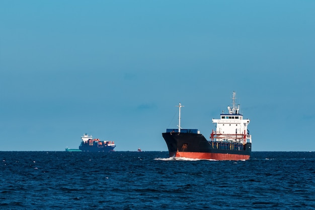 Black bulker ship. Logistics and merchandise transportations