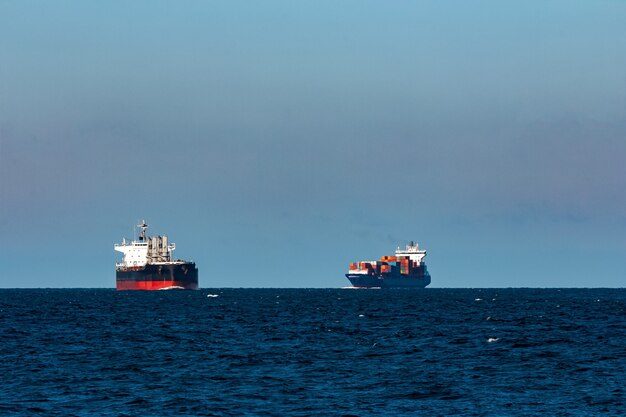 Black bulker ship. Logistics and merchandise transportations