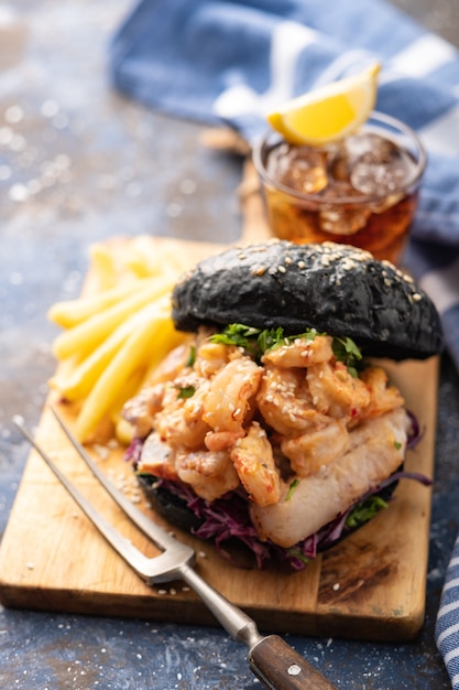 Black burger with fish and shrimps, Fishburger with prawns