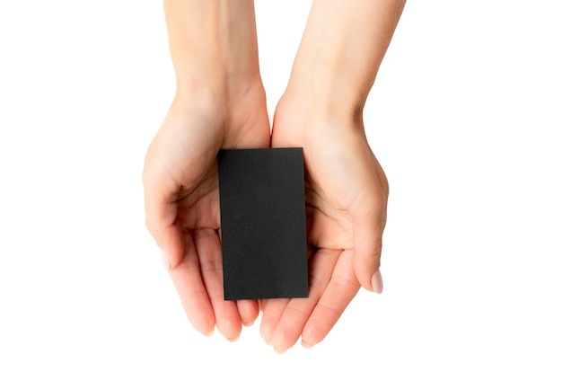 Black business card in girl hands