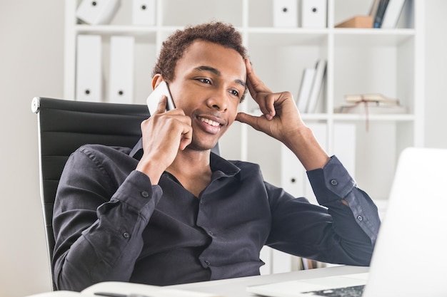 Black businessman on phone