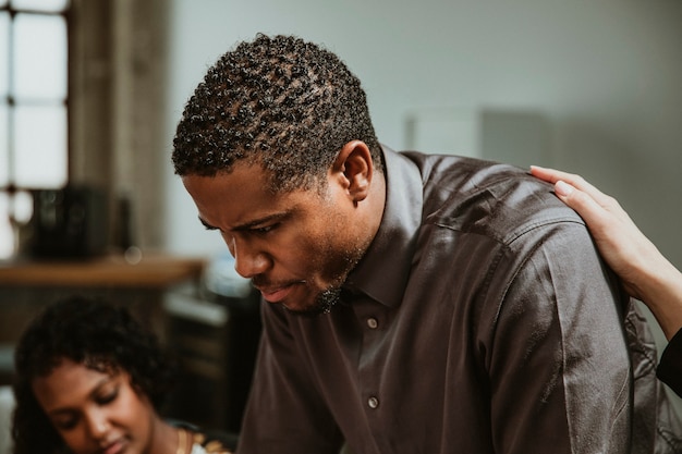 Black businessman working with a team