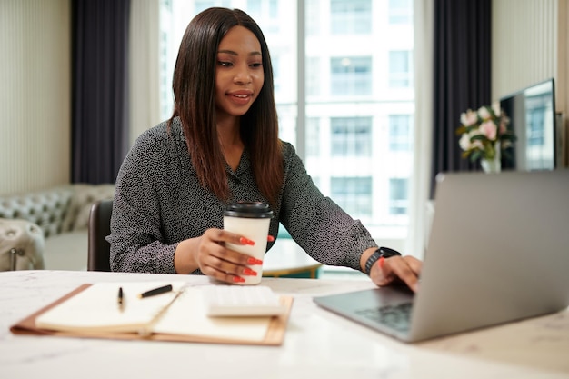 Black Businesswoman Working on Laptop