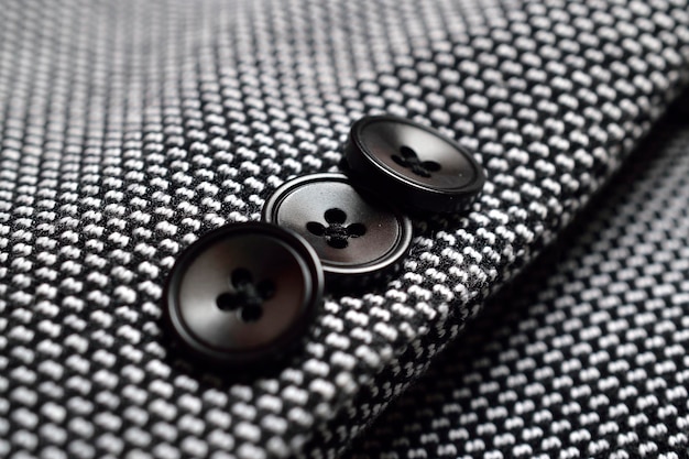 Premium Photo | Black button on tweed suit