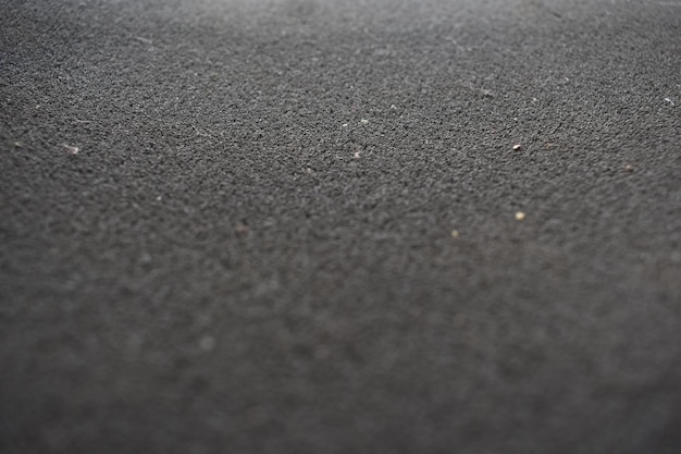 A black carpet with a white background.