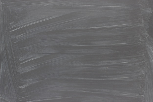 Black chalkboard background. texture blackboard with chalk traces