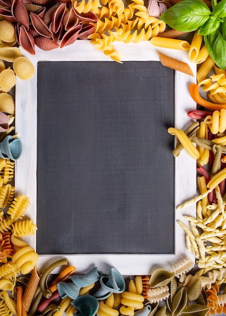 Black chalkboard with italian pasta