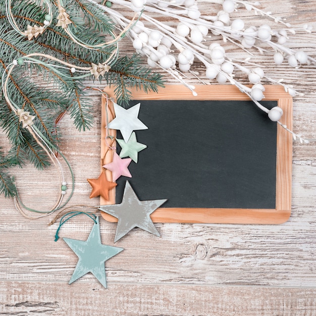 Black chalkboard with winter decorations