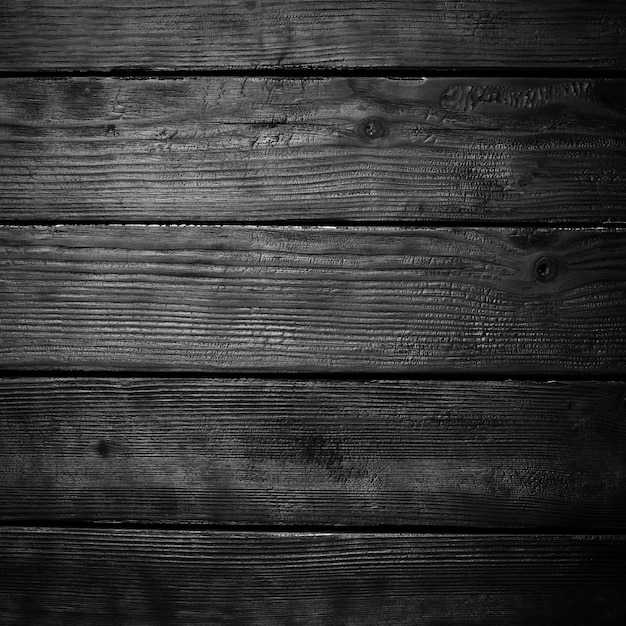 Black charred wooden background Wood texture Top view Free space for your text