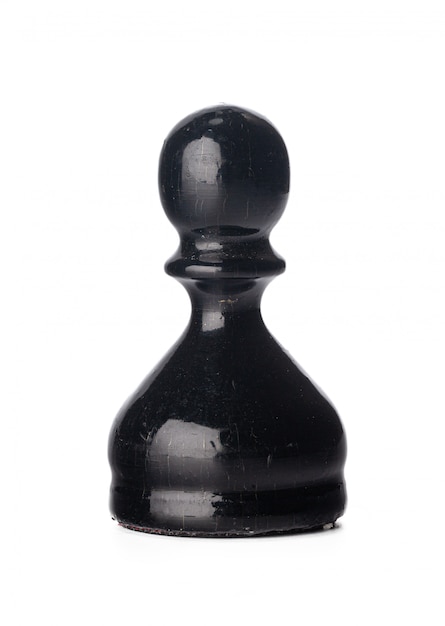 Фото Черная шахматная фигура на белом