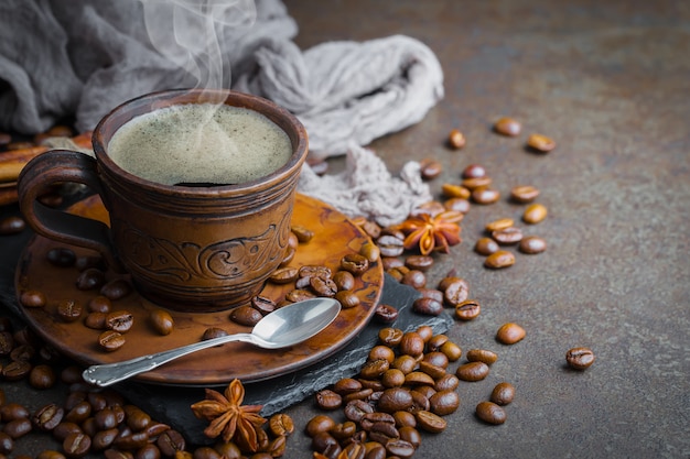 Black coffee beans on an old background