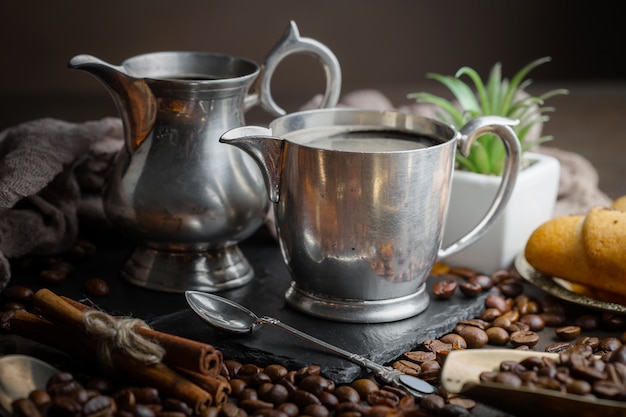 Black coffee beans on an old background