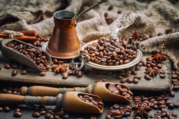 Black coffee beans on an old background